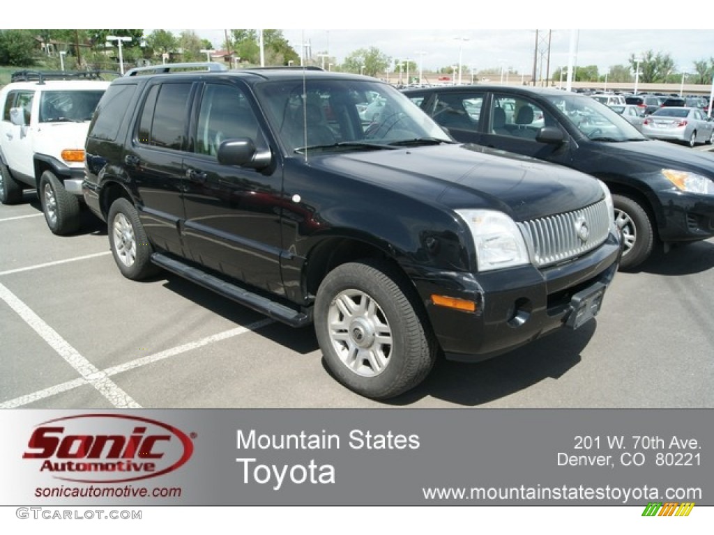 2004 Mountaineer V8 Premier AWD - Black Clearcoat / Medium Dark Parchment photo #1