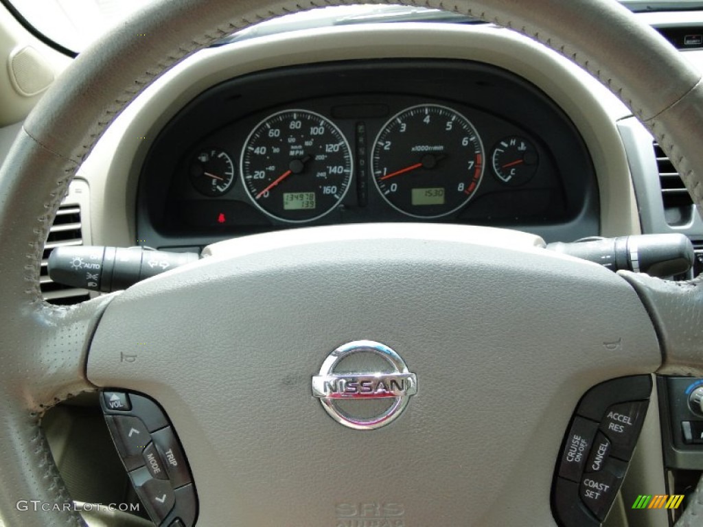 2003 Maxima GLE - Merlot Red / Blond photo #16