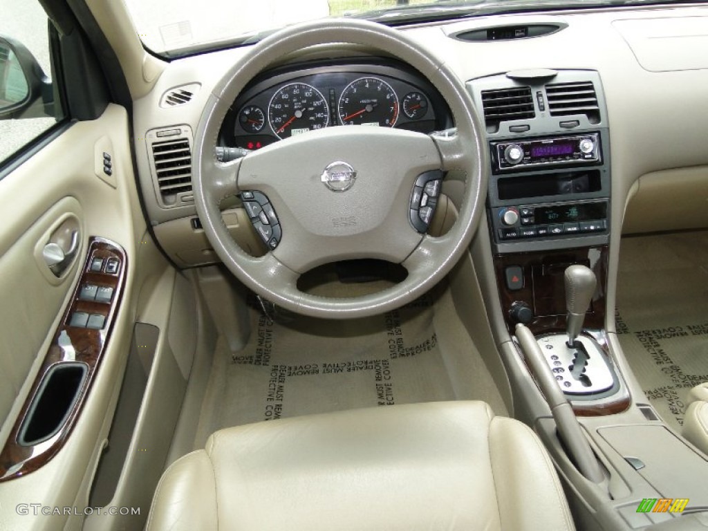 2003 Maxima GLE - Merlot Red / Blond photo #19