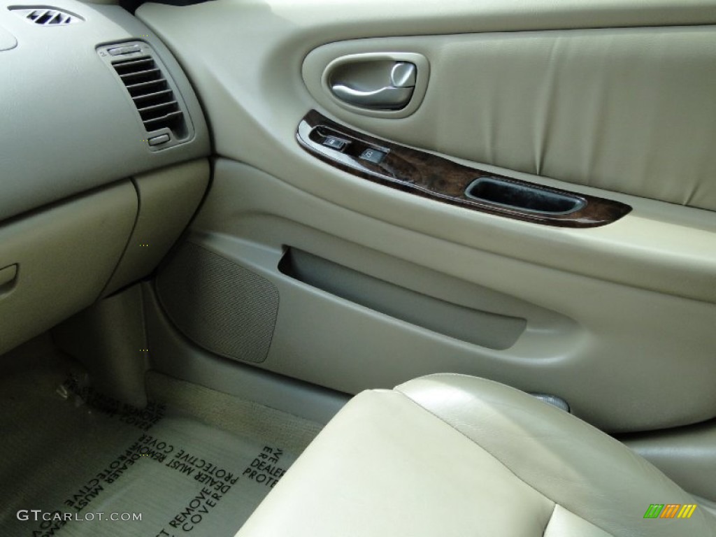 2003 Maxima GLE - Merlot Red / Blond photo #22