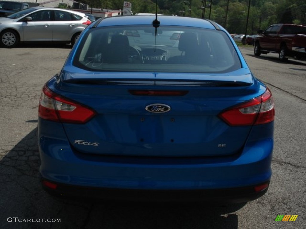 2012 Focus SE Sport Sedan - Blue Candy Metallic / Two-Tone Sport photo #7