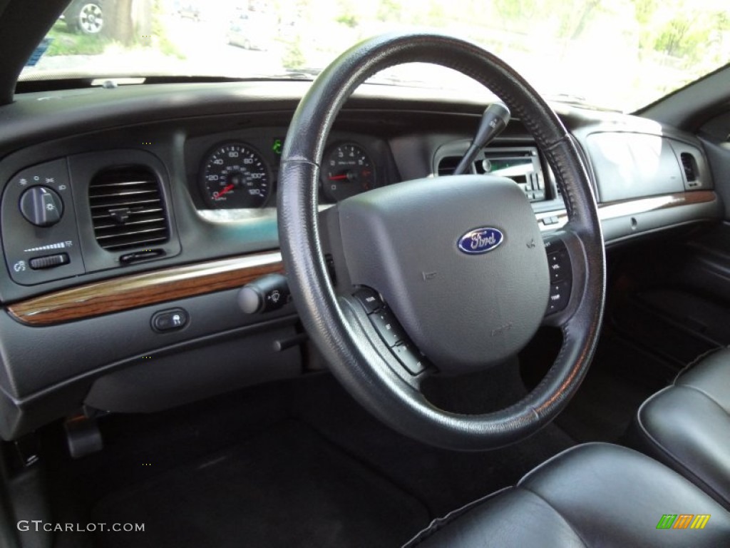 2006 Ford Crown Victoria LX Charcoal Black Steering Wheel Photo #64875609