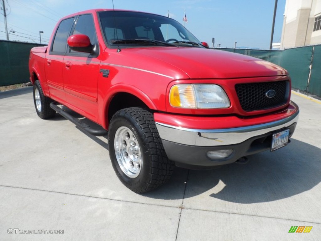 2002 F150 Lariat SuperCrew 4x4 - Bright Red / Medium Parchment photo #1