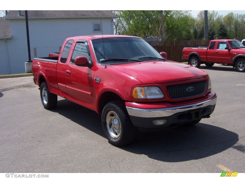 2000 F150 XLT Extended Cab 4x4 - Bright Red / Medium Graphite photo #1