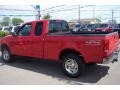 2000 Bright Red Ford F150 XLT Extended Cab 4x4  photo #5
