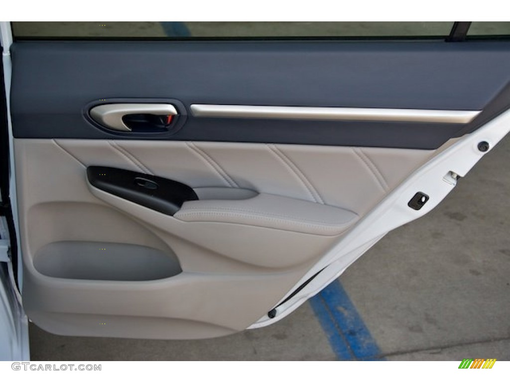 2010 Honda Civic Hybrid Sedan Blue Door Panel Photo #64979273