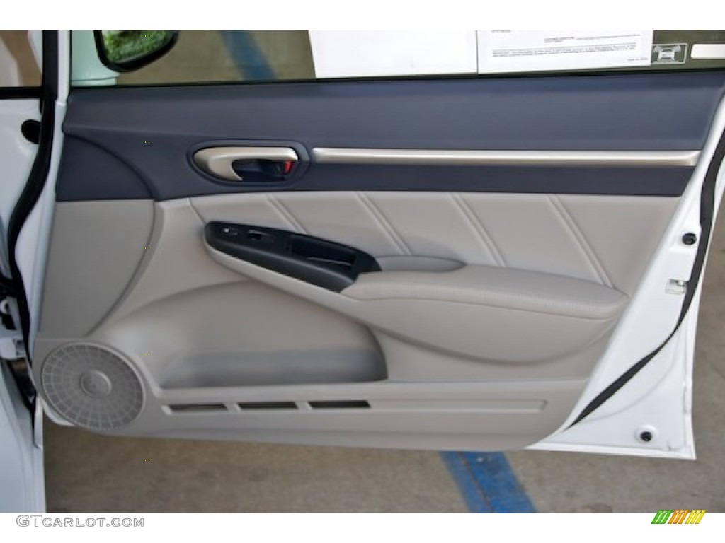 2010 Honda Civic Hybrid Sedan Blue Door Panel Photo #64979282