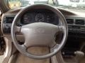 Beige Steering Wheel Photo for 1997 Toyota Corolla #65014536