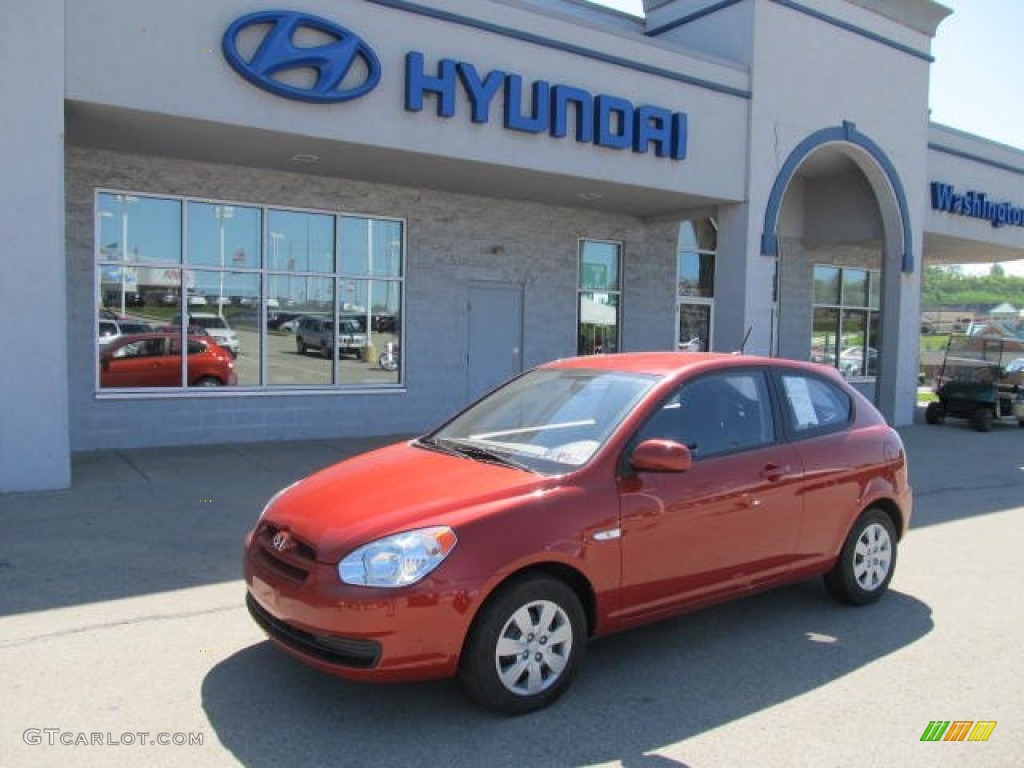 2011 Accent GL 3 Door - Sunset Orange / Black photo #1