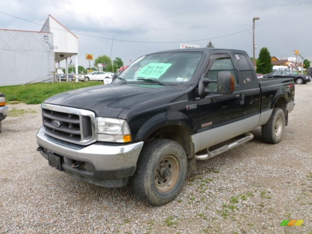 2004 F250 Super Duty FX4 SuperCab 4x4 - Black / Medium Flint photo #1