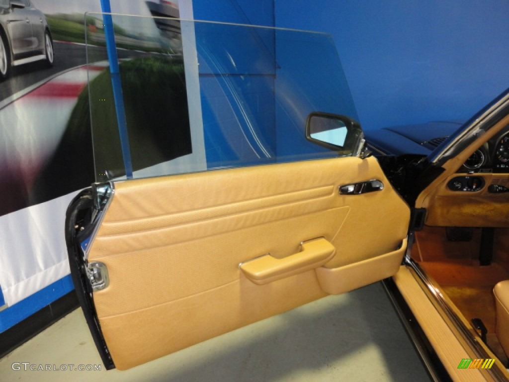 1986 Mercedes-Benz SL Class 560 SL Roadster Palomino Door Panel Photo #65128174