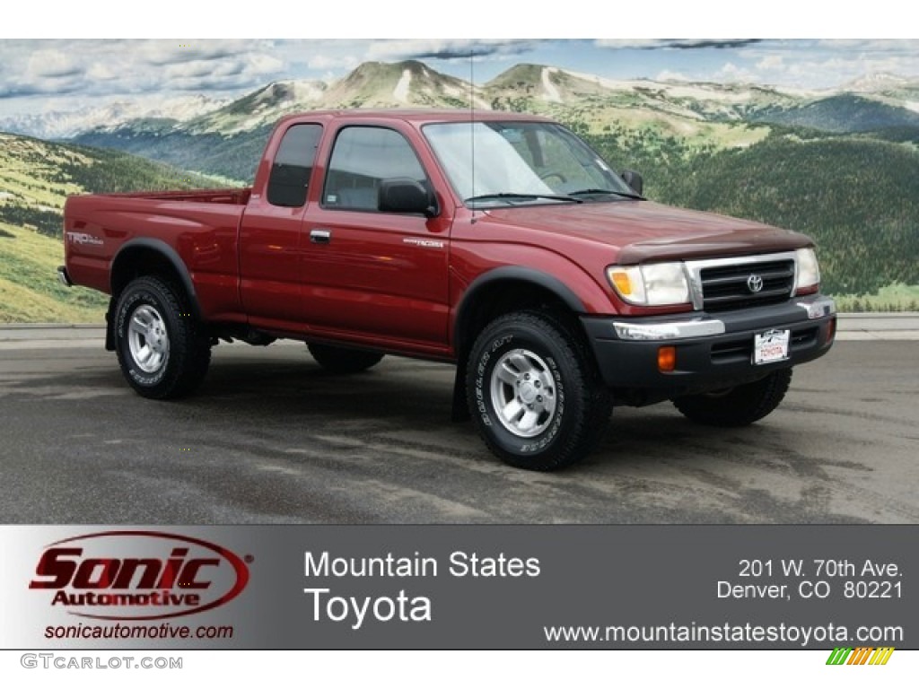 2000 Tacoma V6 TRD Extended Cab 4x4 - Sunfire Red Pearl / Oak photo #1