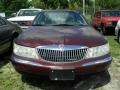 2001 Autumn Red Metallic Lincoln Continental   photo #2