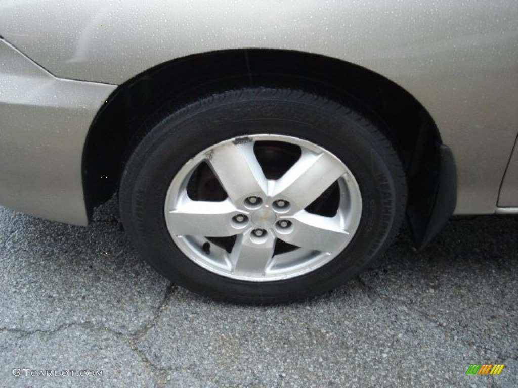 2004 Cavalier LS Sedan - Sandrift Metallic / Neutral photo #11