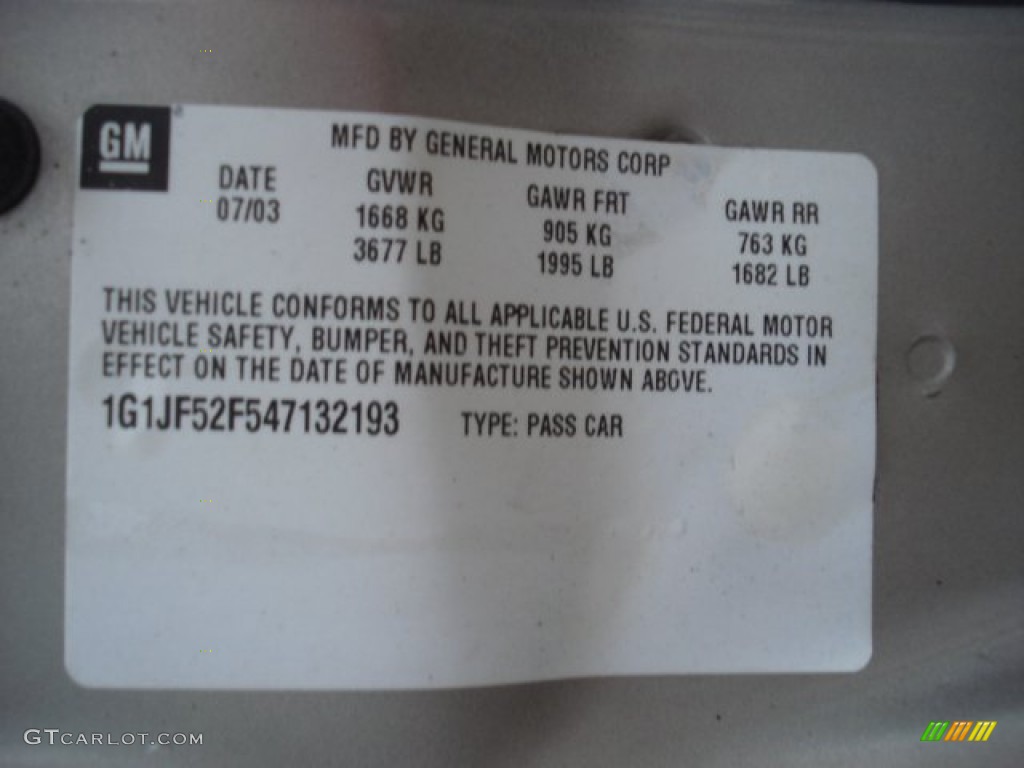 2004 Cavalier LS Sedan - Sandrift Metallic / Neutral photo #25