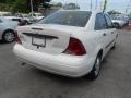 2004 Cloud 9 White Ford Focus LX Sedan  photo #5