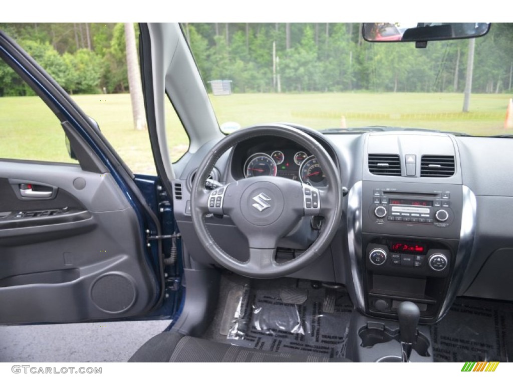2010 SX4 Crossover Touring AWD - Deep Sea Blue Metallic / Black photo #13