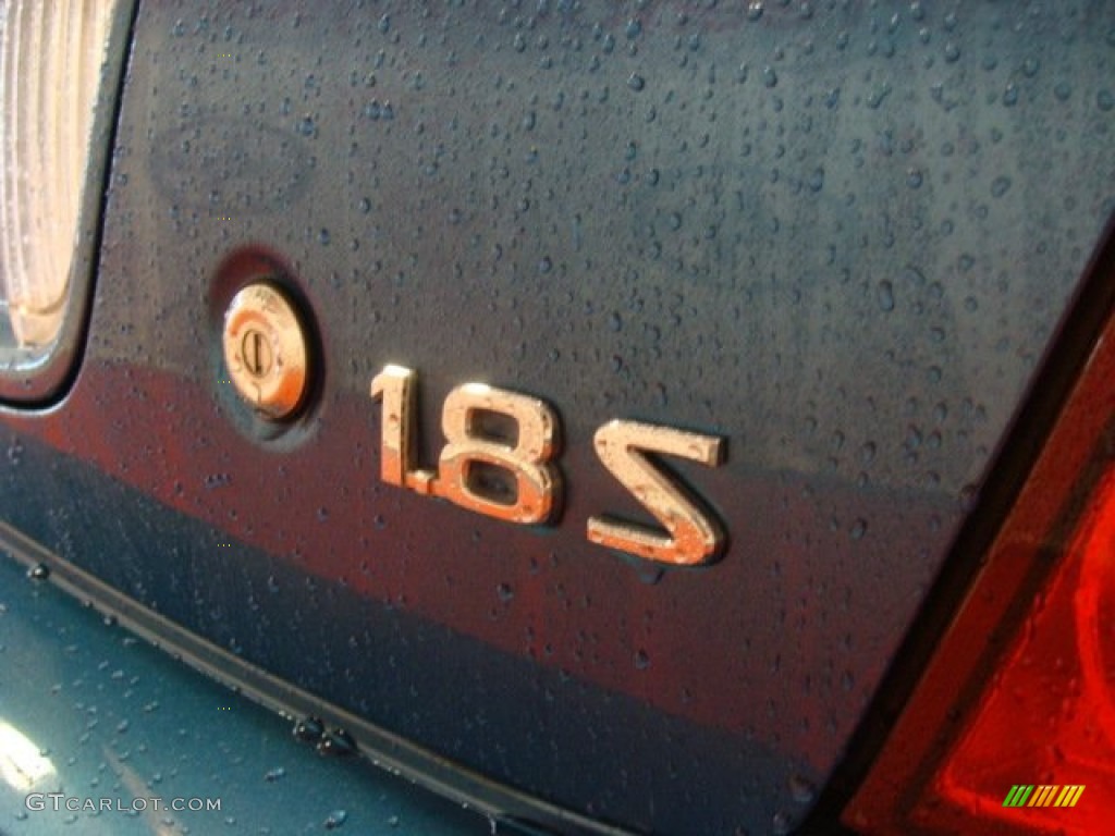 2004 Nissan Sentra 1.8 S Marks and Logos Photo #65208550