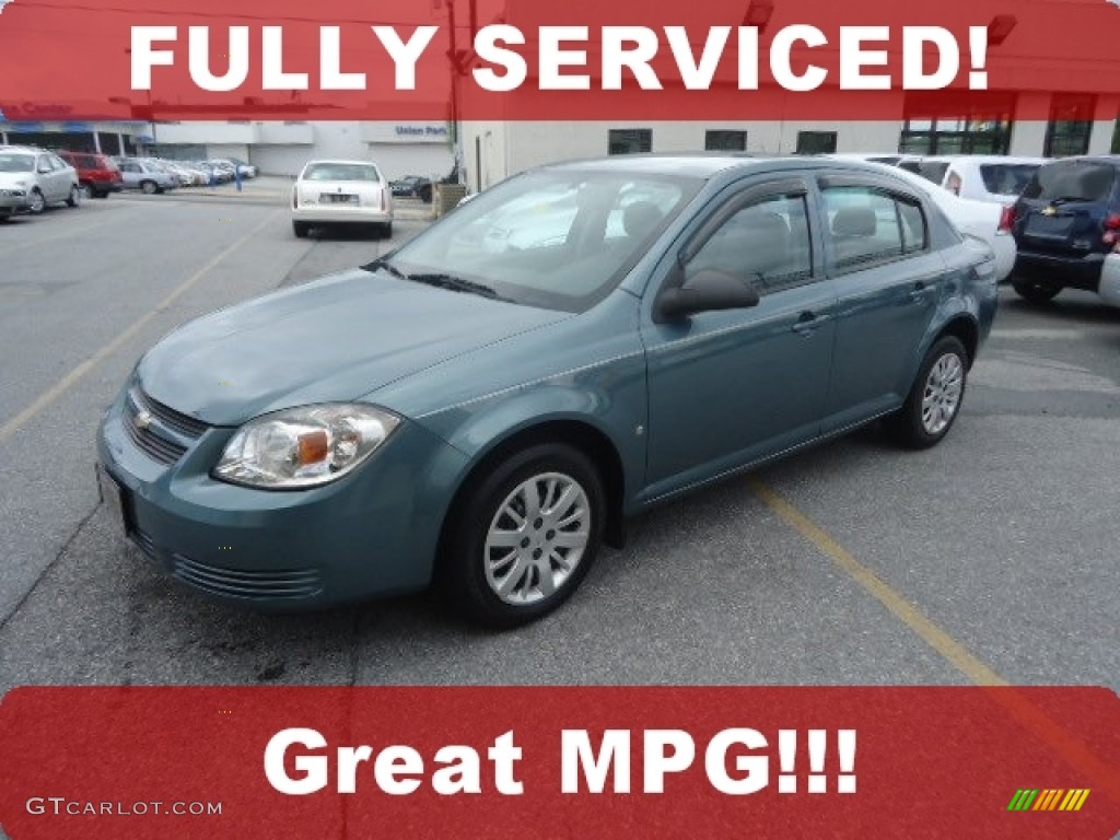 2009 Cobalt LS Sedan - Silver Moss Metallic / Gray photo #1