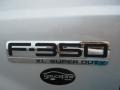 2005 Ford F350 Super Duty XL Regular Cab 4x4 Stake Truck Badge and Logo Photo