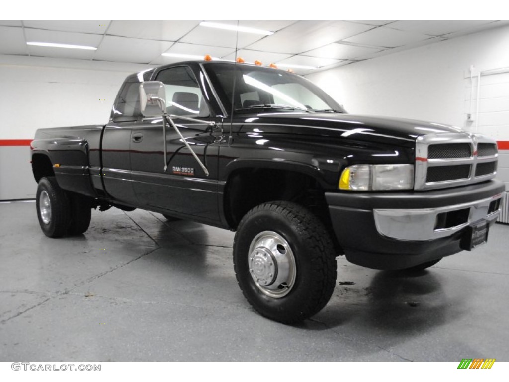 Black 1997 Dodge Ram 3500 Laramie Extended Cab 4x4 Dually Exterior Photo #65296106