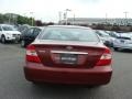 2004 Salsa Red Pearl Toyota Camry LE  photo #5