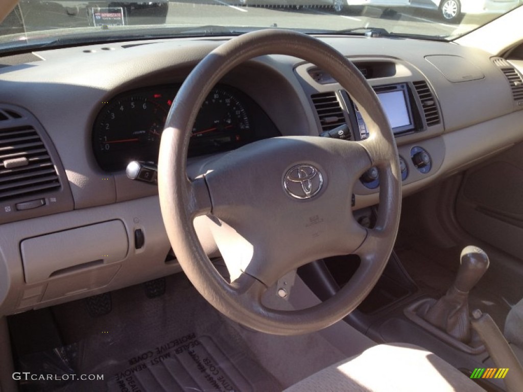 2004 Camry LE - Black / Stone photo #22