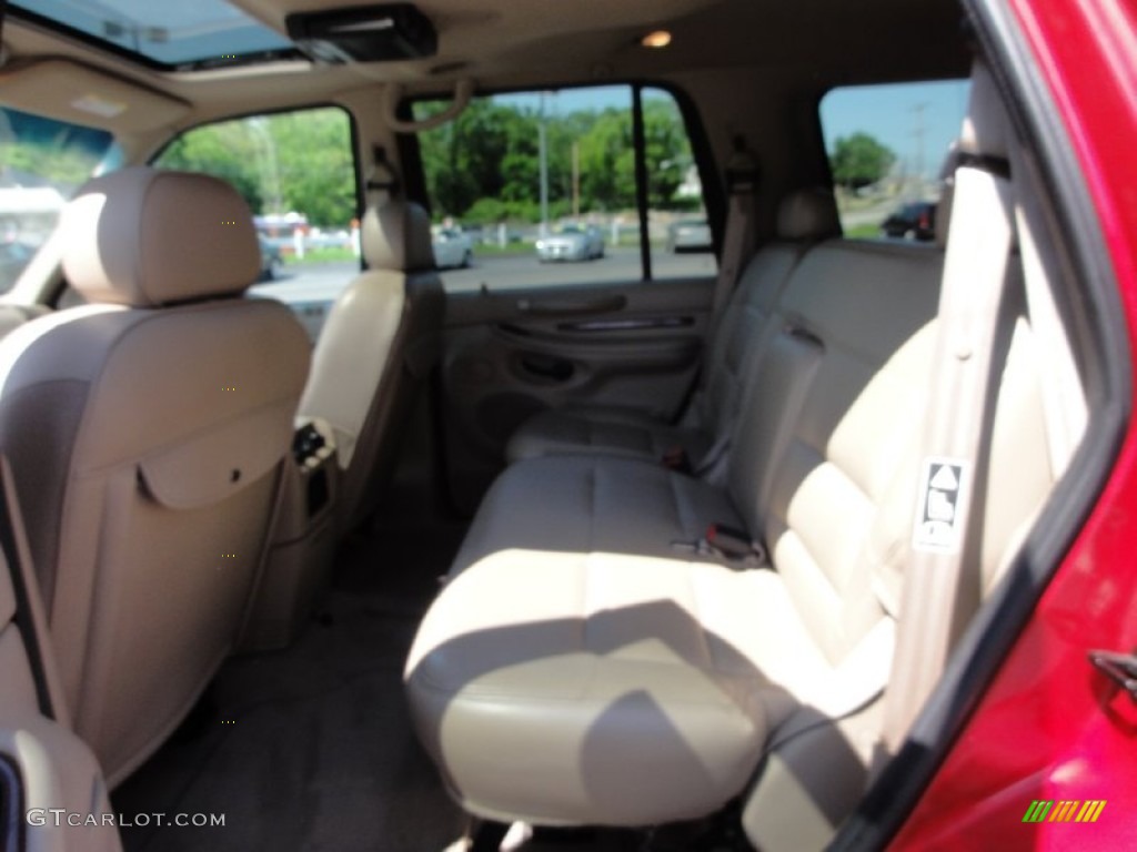 2002 Navigator Luxury 4x4 - Laser Red Tinted Metallic / Medium Parchment photo #26