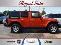 2010 Mango Tango Pearl Jeep Wrangler Unlimited Rubicon 4x4  photo #1