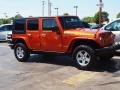 2010 Mango Tango Pearl Jeep Wrangler Unlimited Rubicon 4x4  photo #2