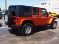 2010 Mango Tango Pearl Jeep Wrangler Unlimited Rubicon 4x4  photo #3