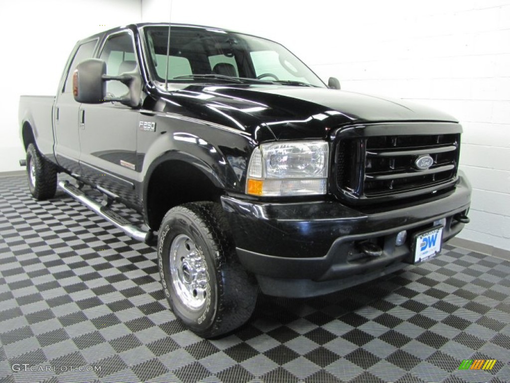 2003 F250 Super Duty XLT Crew Cab 4x4 - Black / Medium Flint Grey photo #1