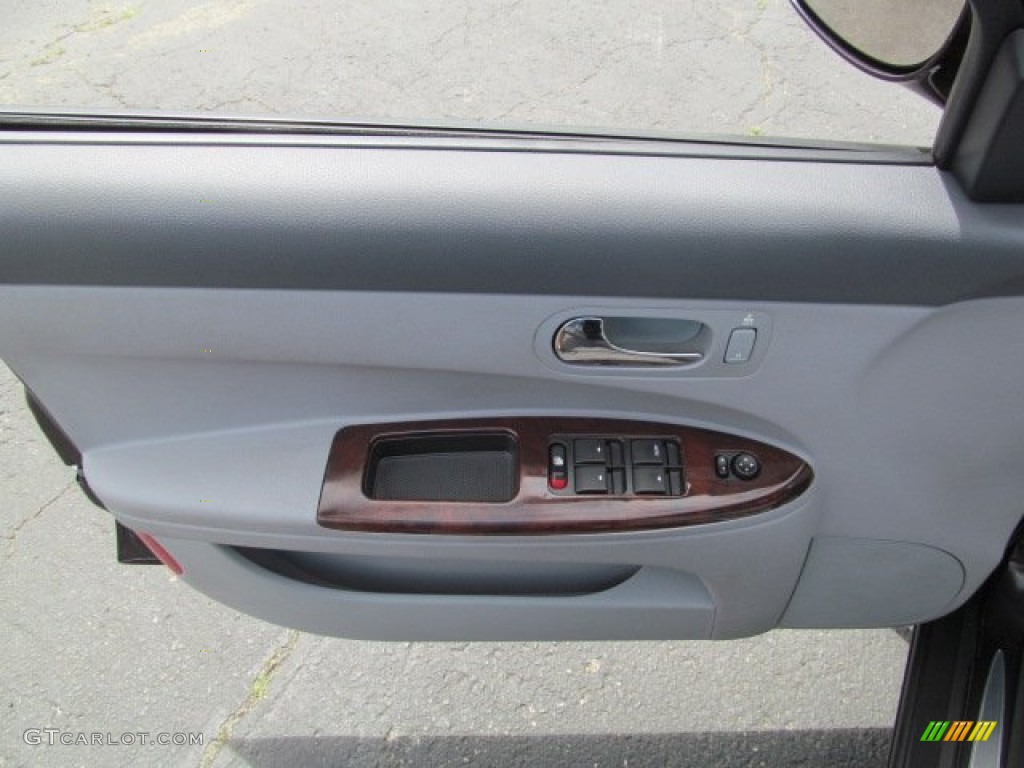 2007 Buick LaCrosse CX Gray Door Panel Photo #65471131