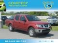Red Brick 2010 Nissan Frontier SE Crew Cab