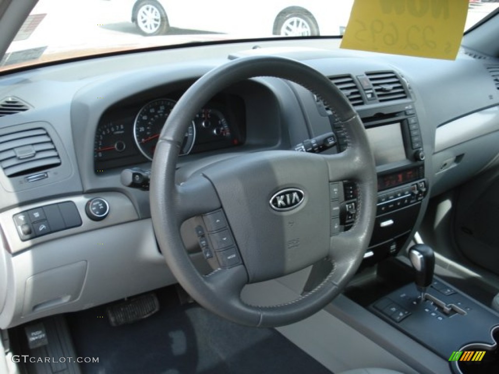 2009 Kia Borrego LX V6 4x4 Beige Steering Wheel Photo #65516045
