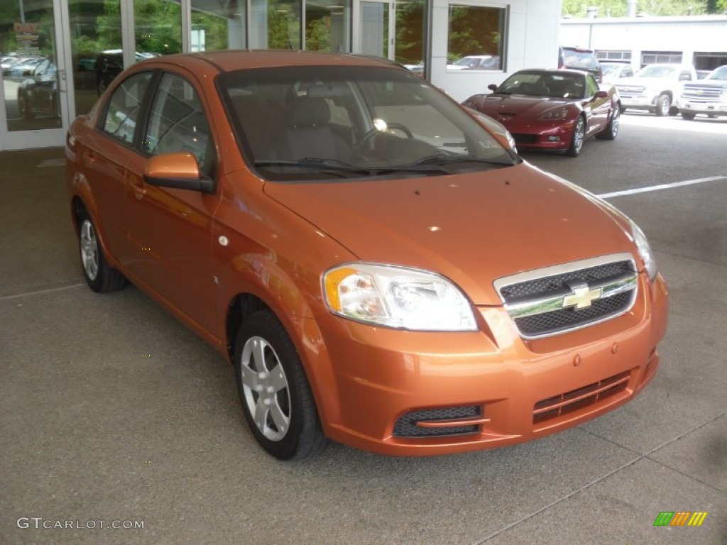 2008 Aveo LS Sedan - Spicy Orange Metallic / Charcoal photo #1