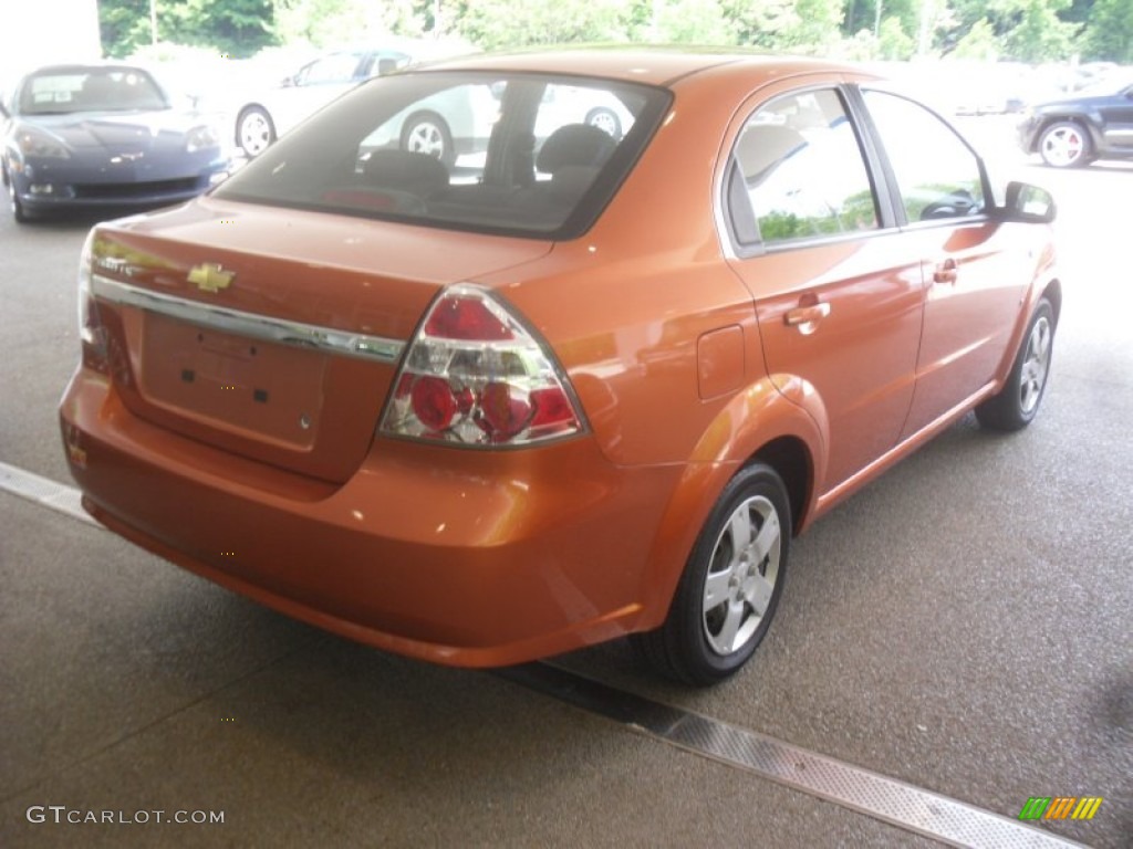 2008 Aveo LS Sedan - Spicy Orange Metallic / Charcoal photo #6