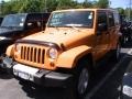 2012 Dozer Yellow Jeep Wrangler Unlimited Sahara 4x4  photo #1