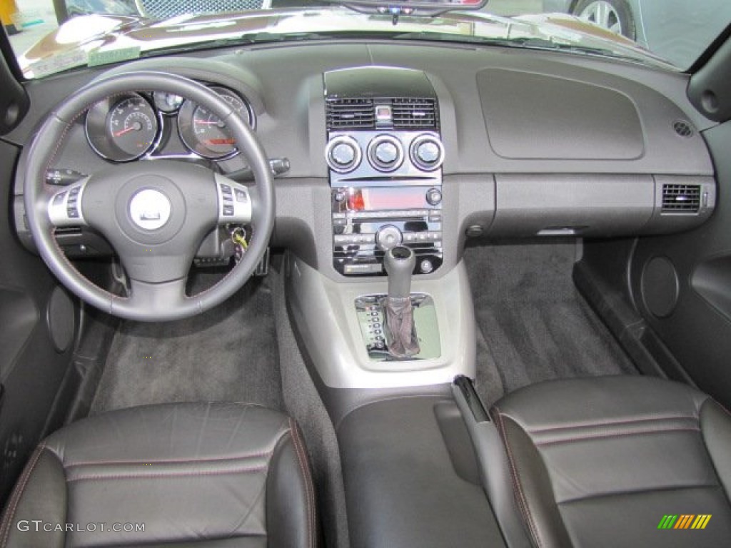 2009 Saturn Sky Ruby Red Special Edition Roadster Black Dashboard Photo #65540361