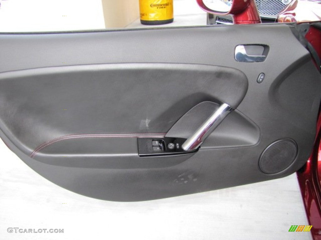 2009 Saturn Sky Ruby Red Special Edition Roadster Black Door Panel Photo #65540640