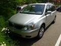 2012 Bright Silver Kia Sedona LX  photo #1