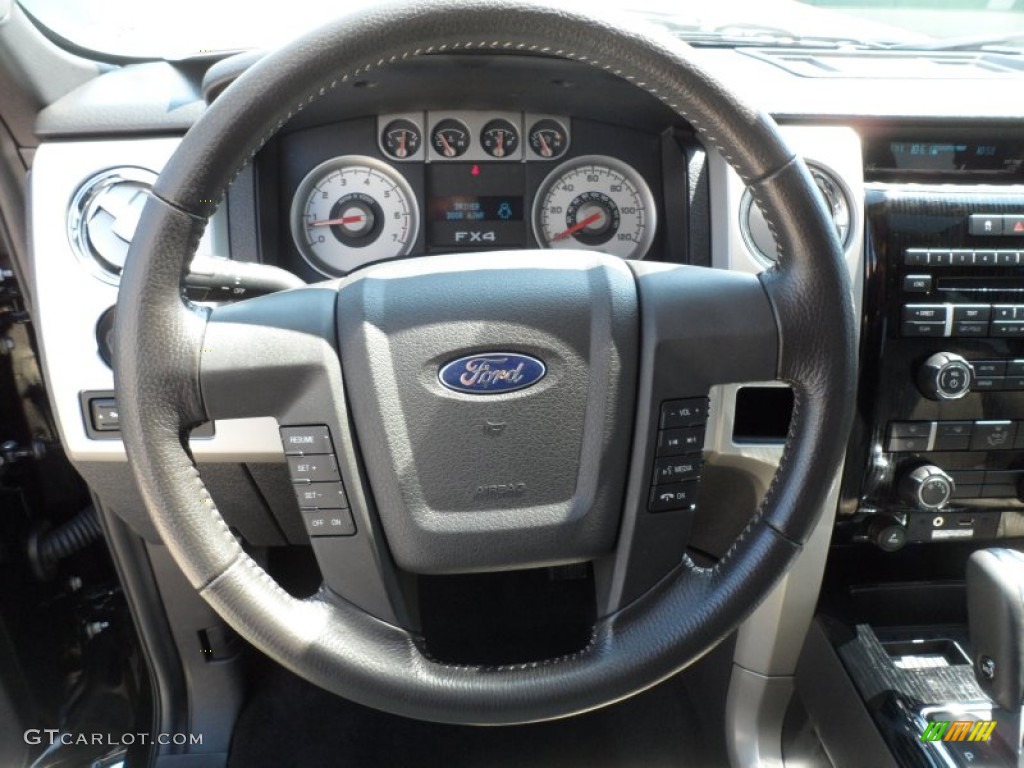 2009 Ford F150 FX4 SuperCab 4x4 Black/Medium Stone Steering Wheel Photo #65557211