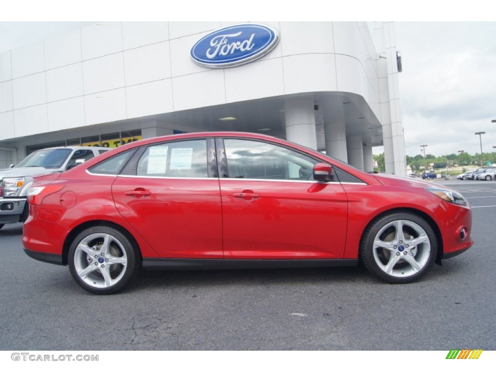 2012 Focus Titanium Sedan - Red Candy Metallic / Charcoal Black Leather photo #2