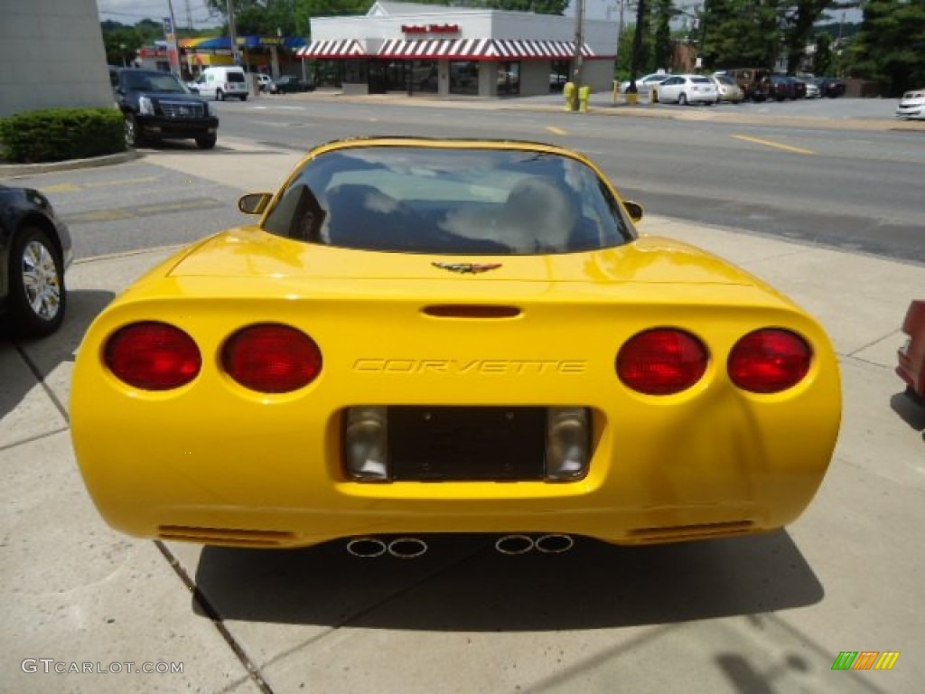 Millenium Yellow 2004 Chevrolet Corvette Coupe Exterior Photo #65599502