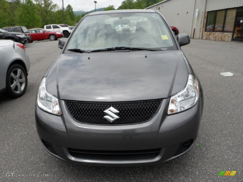 2010 SX4 Sedan LE - Azure Grey Metallic / Beige photo #6