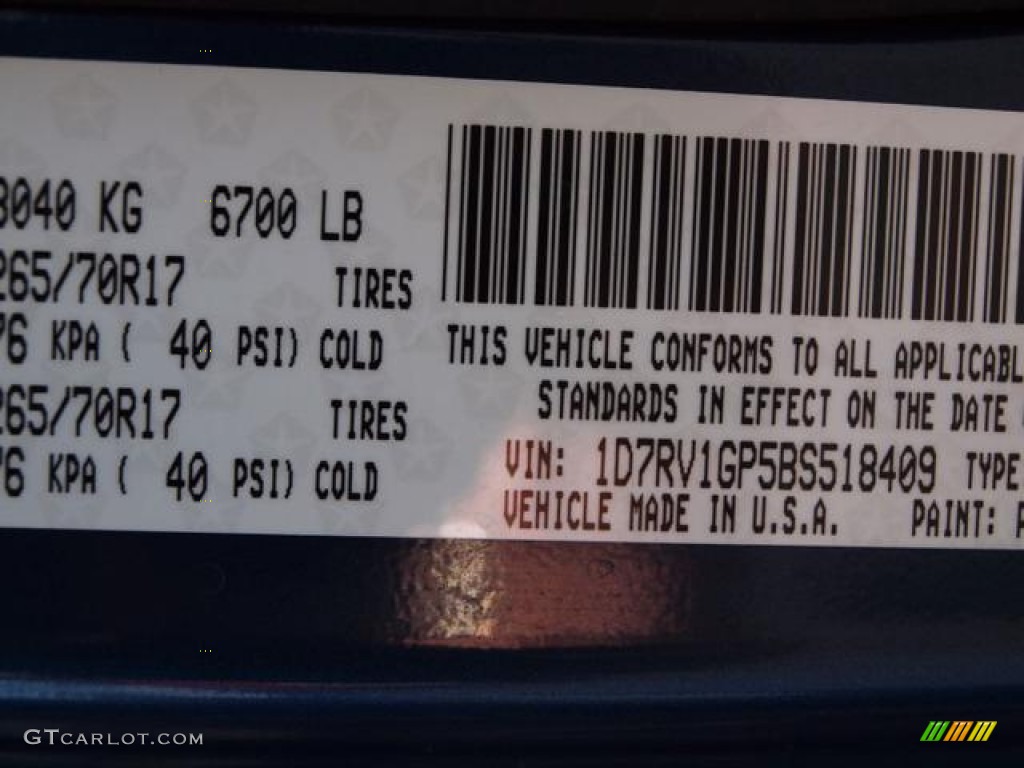 2011 Ram 1500 SLT Quad Cab 4x4 - Deep Water Blue Pearl / Dark Slate Gray/Medium Graystone photo #17