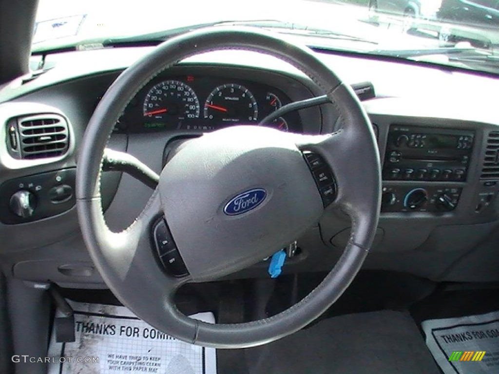 2003 Ford F150 XLT SuperCab Medium Graphite Grey Steering Wheel Photo #65651299