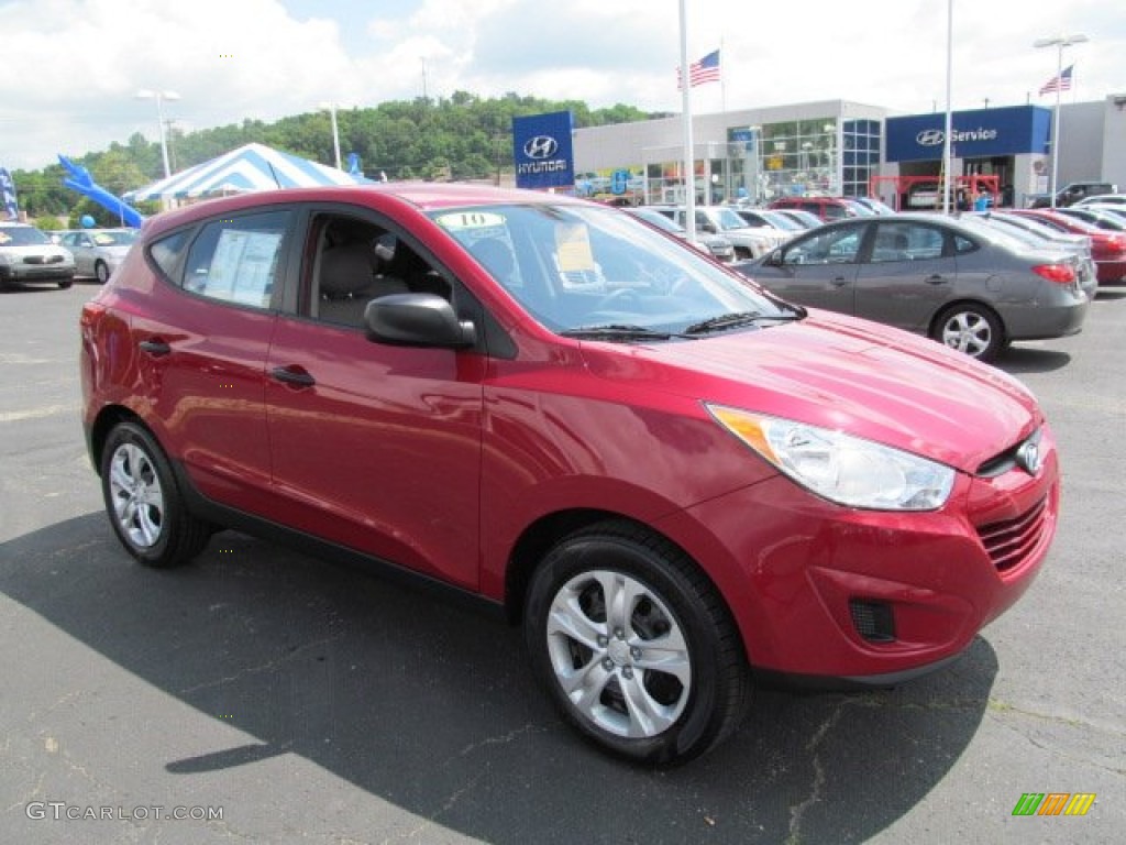 2010 Tucson GLS - Garnet Red / Taupe photo #1