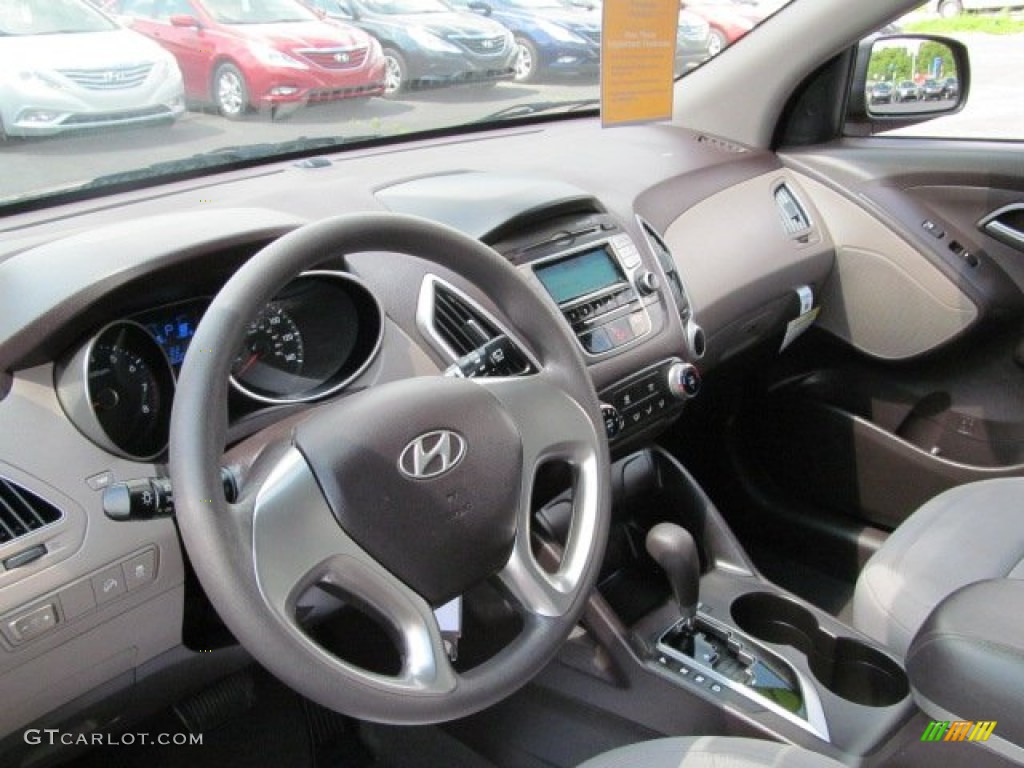 2010 Hyundai Tucson GLS Taupe Dashboard Photo #65657512