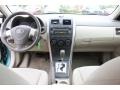 Bisque Dashboard Photo for 2010 Toyota Corolla #65685615